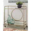 Jackford Bar Cart Antique Gold Finish - Signature Design By Ashley -Famous Furniture Store GUEST 5f52b90d 66ed 4b8f 8605 a88eead19c64