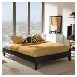 Lancashire Modern And Contemporary Faux Leather Upholstered Bed Frame With Tapered Legs - Baxton Studio 9 Lancashire Modern And Contemporary Faux Leather Upholstered Bed Frame With Tapered Legs - Baxton Studio -Famous Furniture Store GUEST 6a531abb 1182 42c4 9374 f86f6702a504