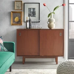 Menlo Console Table With Reversible Sliding Doors - Angelo:Home -Famous Furniture Store GUEST 82016d95 359b 4ea5 869f 780a36fecf6d