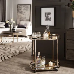 Bartram Oval Bar Cart Champagne Gold - Inspire Q -Famous Furniture Store GUEST dc77bf35 9ded 4c66 95ff c6b25e0765da